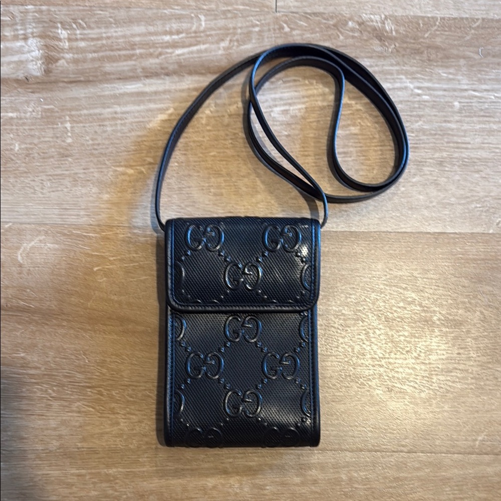 Gucci Embossed Black Leather Pouch